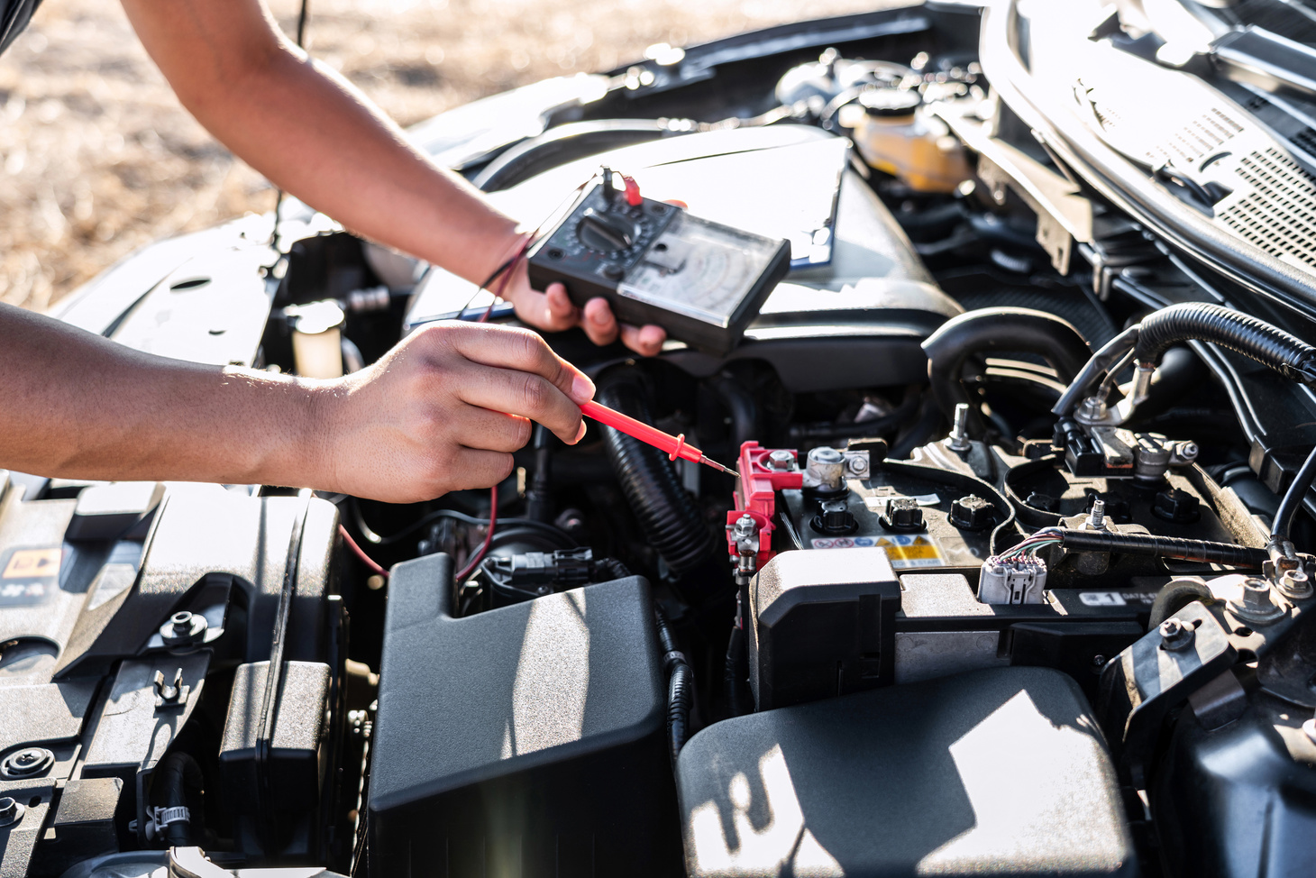 Mechanic Repairman Checking Engine 